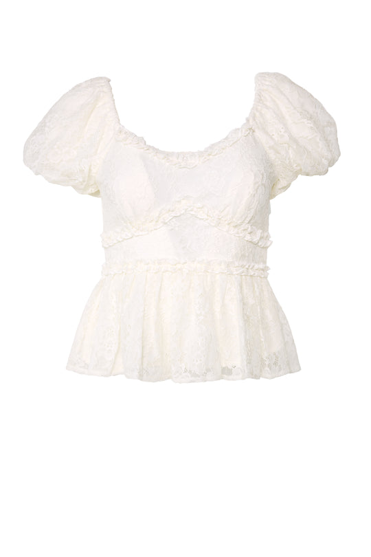 The Torino Top in Ivory Lace by Ivy City Co features short puff sleeves, a scoop neckline, delicate ruffles, and a flared peplum hem.