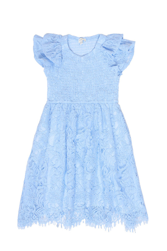 The Mini Hattie Dress in Cornflower Blue Lace by Ivy City Co features delicate cornflower blue lace, short ruffled sleeves, a fitted smocked bodice, and a flared skirt adorned with a beautiful floral lace pattern. Perfect for mommy-and-me matching moments, this charming dress is displayed on a white background.