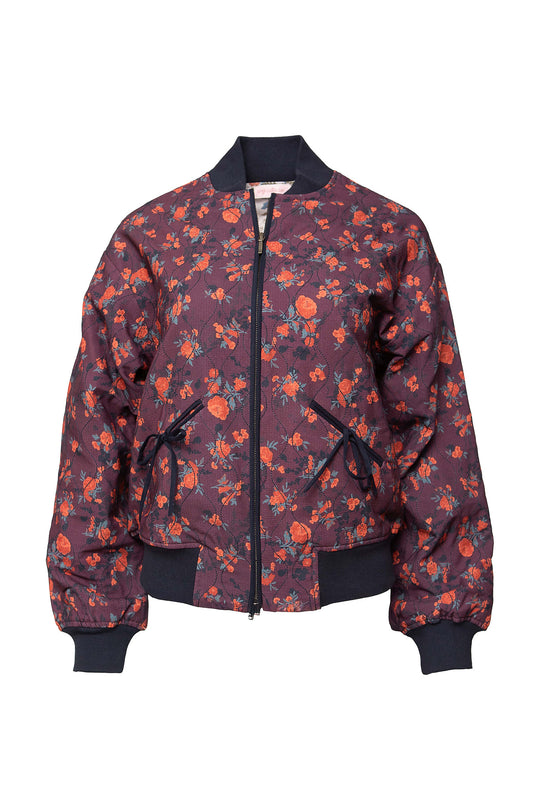 Floral patterned bomber jacket on a white background