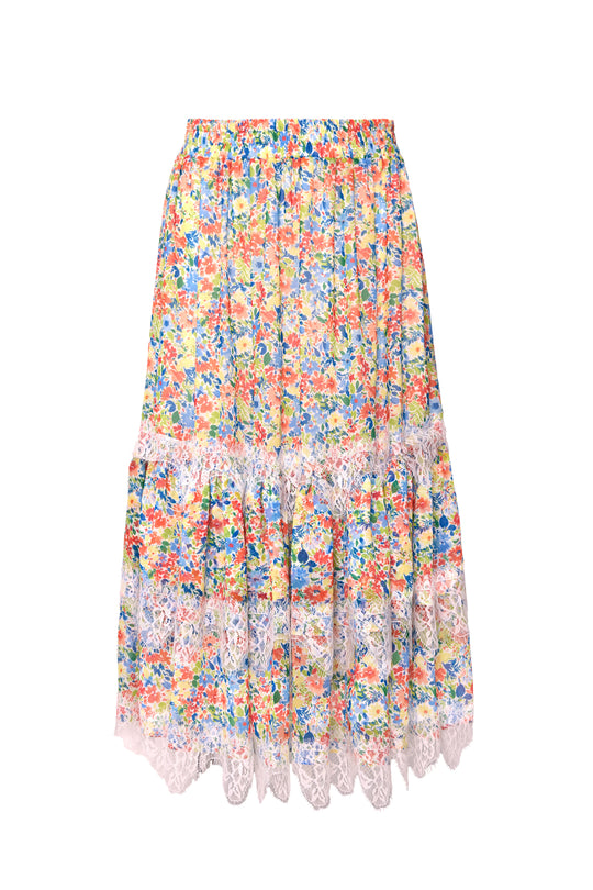 The Verona Skirt in Vibrant Yarrow by Ivy City Co features a colorful floral print, elastic waistband, tiered maxi silhouette, and white lace trim near the hem and lower tiers.