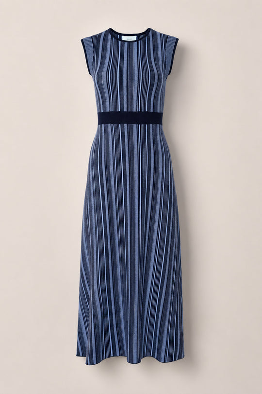The Laurel Dress in Midnight by Ivy City Co is a sleeveless, navy blue and light blue midi dress featuring vertical stripes and a fitted waist. Crafted from comfortable sweater knit fabric for chic style and maternity-friendly wear, it is displayed against a plain beige background.