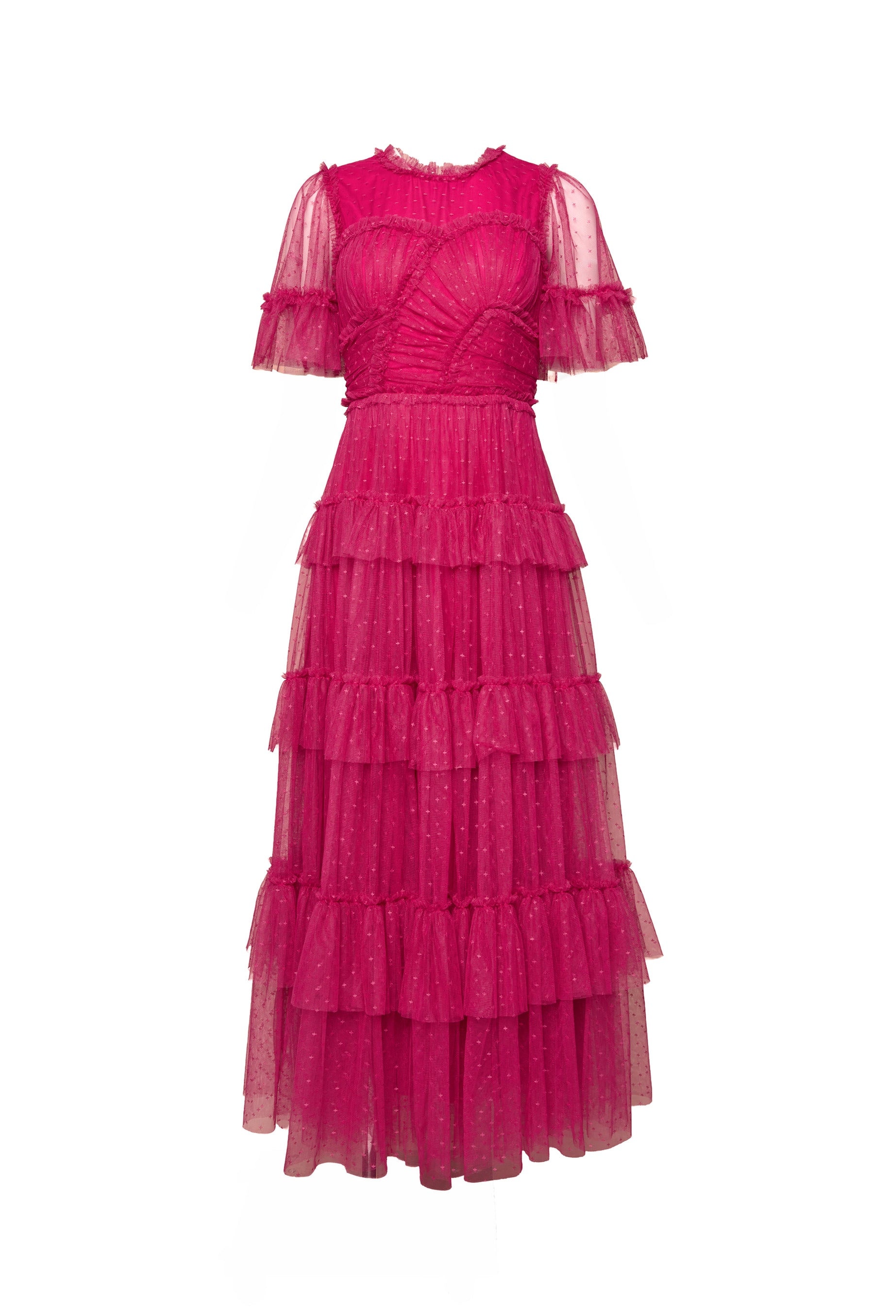 The Whimsical Dress in Fuchsia by Ivy City Co features short sheer sleeves, a fitted bodice, and a tiered tulle skirt crafted from delicate dotted mesh with subtle pleats for an elegant touch.