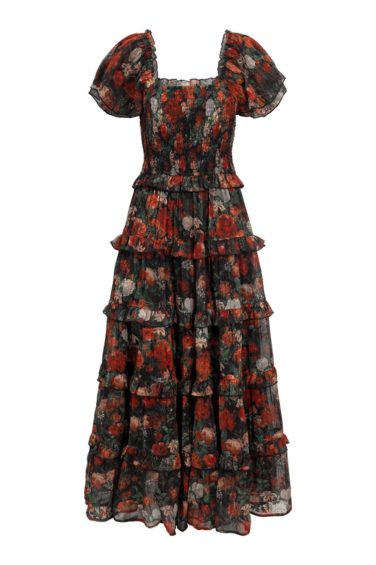Floral patterned dress with puff sleeves on a white background