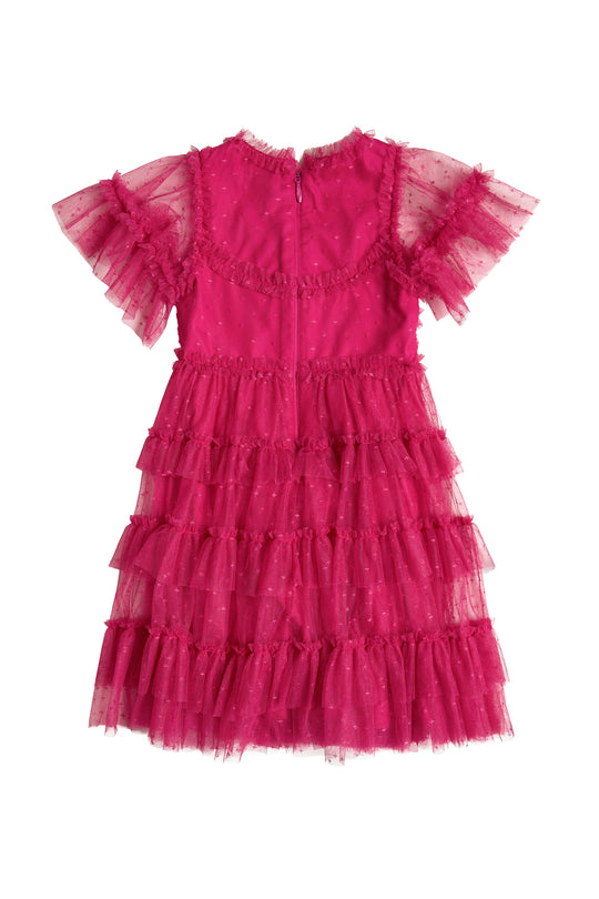 The Mini Whimsical Dress in Fuchsia by Ivy City Co is shown from the back against a white background, featuring flutter sleeves, a layered tulle skirt, and delicate dotted patterns.