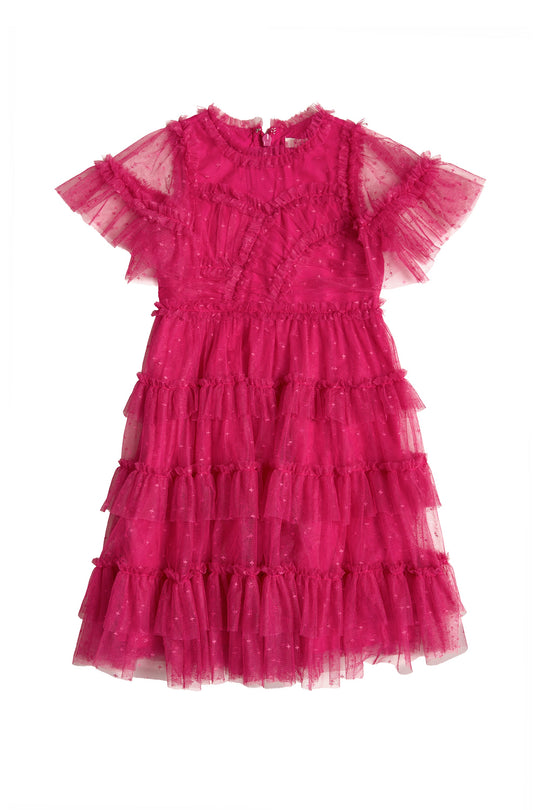 The Ivy City Co Mini Whimsical Dress in Fuchsia is a bright pink dress for girls, featuring flutter sleeves, a fitted bodice, and a layered tulle skirt with delicate dotted detailing and a high neckline.