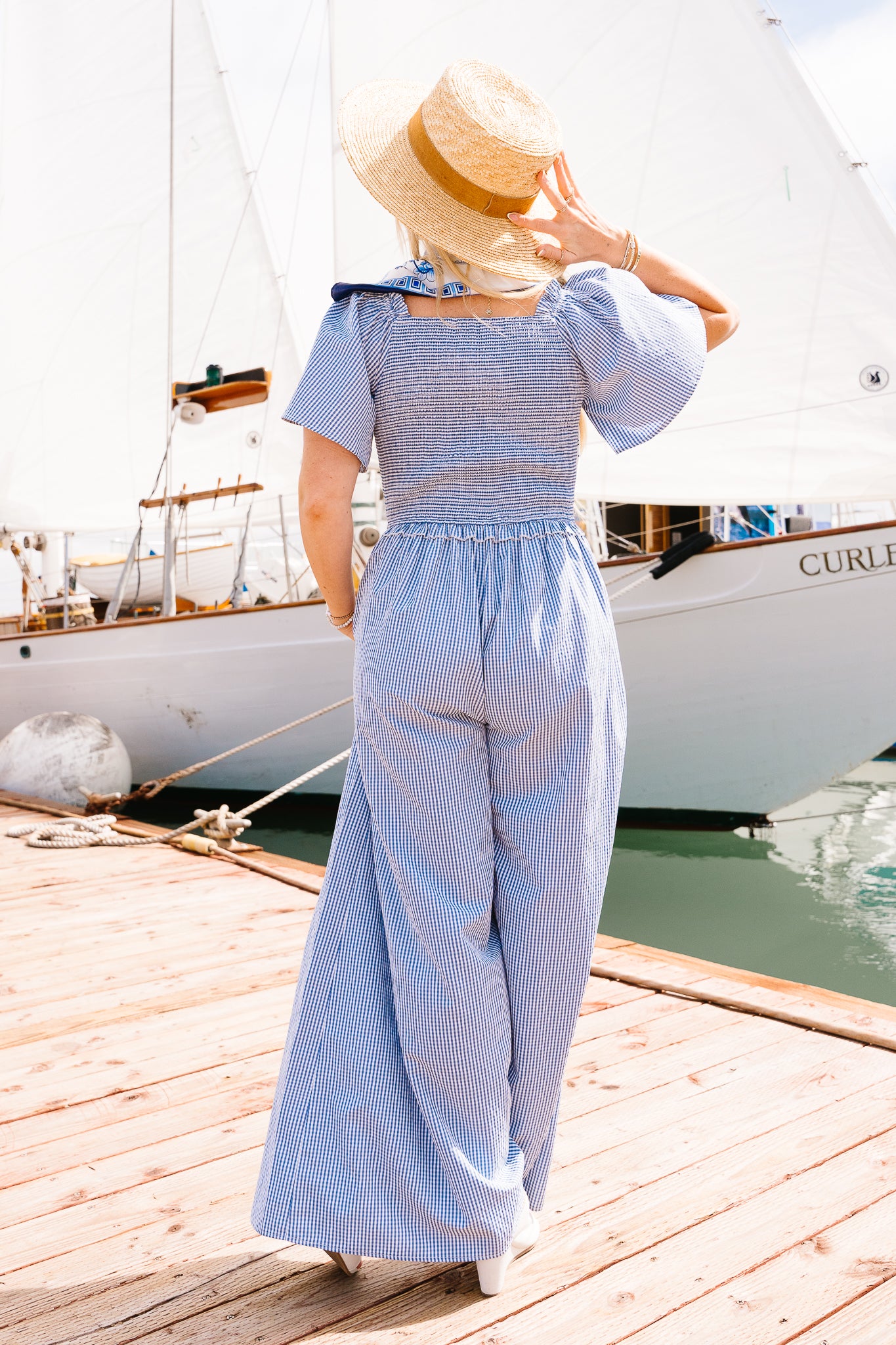 Blue gingham jumpsuit on sale