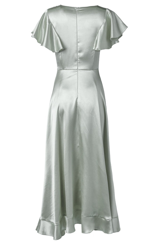 The Callie Dress in Sage Satin by Ivy City Co features a pale green satin finish, short flutter sleeves, and a flared hem. Shown from the back, this midi dress highlights a fitted waist and a visible zipper—making it an ideal choice for a sage satin bridesmaid dress.