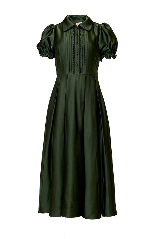 Sophia Dress in Green Satin, a dark green midi dress with a collared neckline, short puff sleeves, and a button-front bodice trimmed with black lace.