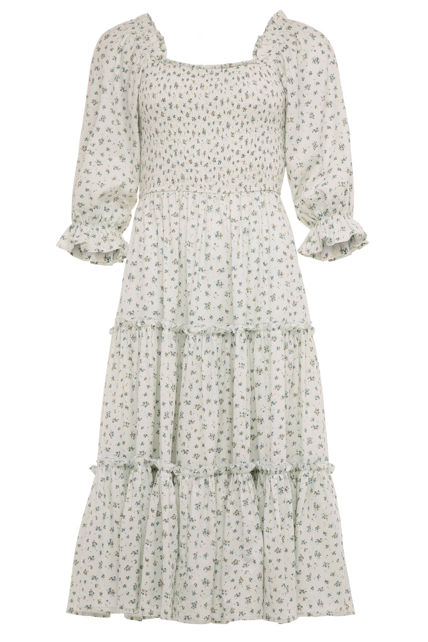The Madeline Dress in Blue by Ivy City Co is a blue, long, tiered floral midi dress with a smocked bodice, three-quarter puff sleeves with ruffled cuffs, and a square neckline—an effortlessly maternity friendly style.