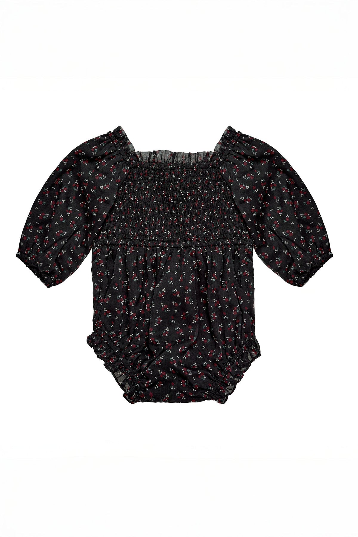 The Ivy City Co Baby Madeline Romper in Black Ditsy Floral features a delicate red and white ditsy print, puffed half-sleeves, a smocked bodice, and ruffled elastic leg openings, beautifully laid flat on a white background.