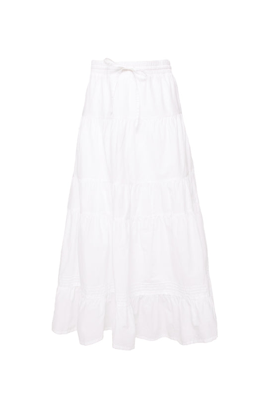 The Sansa Skirt in White by Ivy City Co is an ankle-length cotton voile skirt with a ruffled hem, elastic drawstring waistband, elegant tiers, and maternity-friendly design, shown against a plain white background.