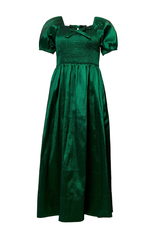 Ivy City Co Cassie Dress in Green Taffeta, an emerald green midi dress with puff sleeves, a smocked bodice, and a square neckline featuring a small bow.