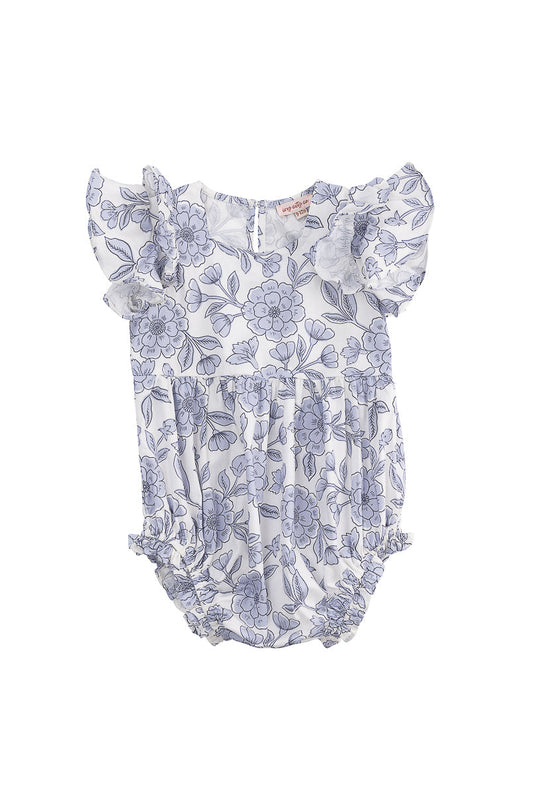 The Baby Hattie Romper in Blue Floral by Ivy City Co is a white cotton romper for babies, featuring short ruffled sleeves, a delightful blue floral pattern, a gathered waist, and elastic leg openings for extra comfort.