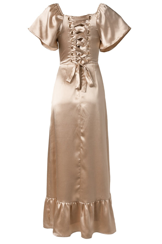 The Maddie Dress in Champagne Satin by Ivy City Co is a long, shiny satin gown with short puff sleeves, a lace-up corset front, and a ruffled hem—an elegant maxi dress that’s perfect for any occasion.